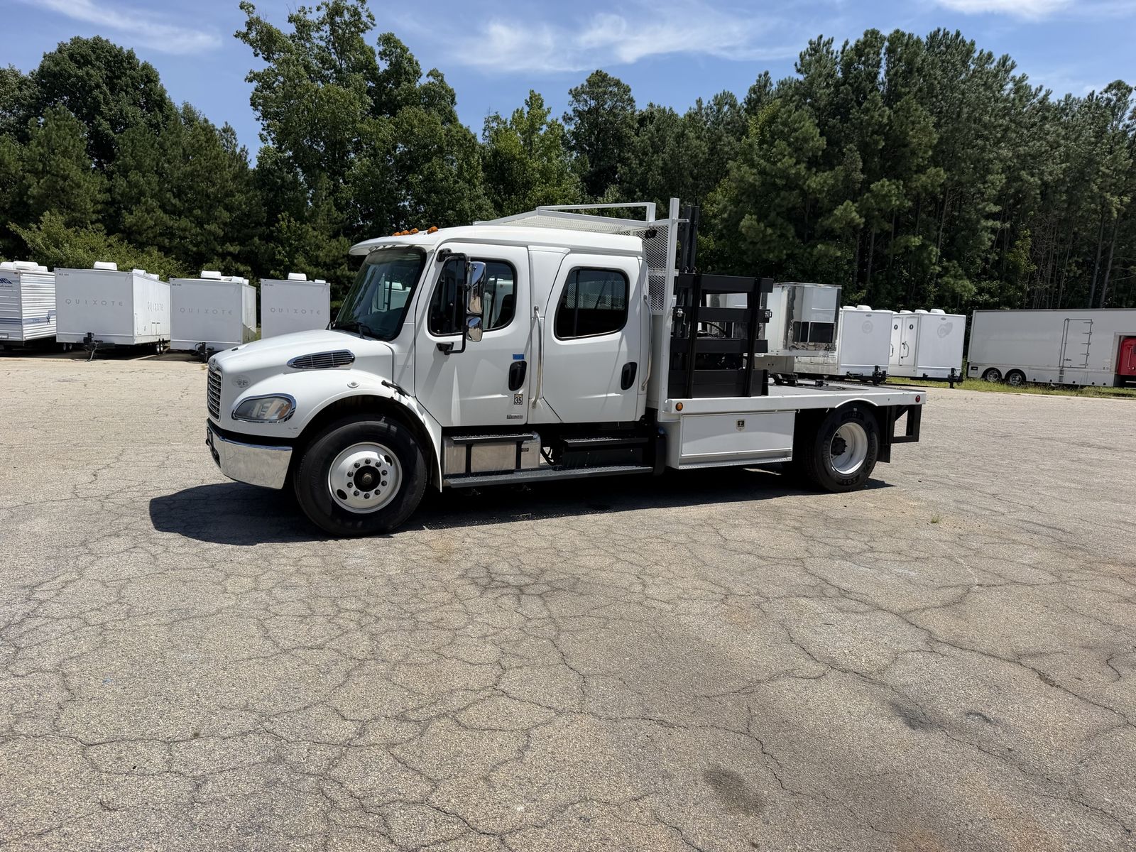 Freightliner Business Class M2 Crew Cab Flatbed Truck White