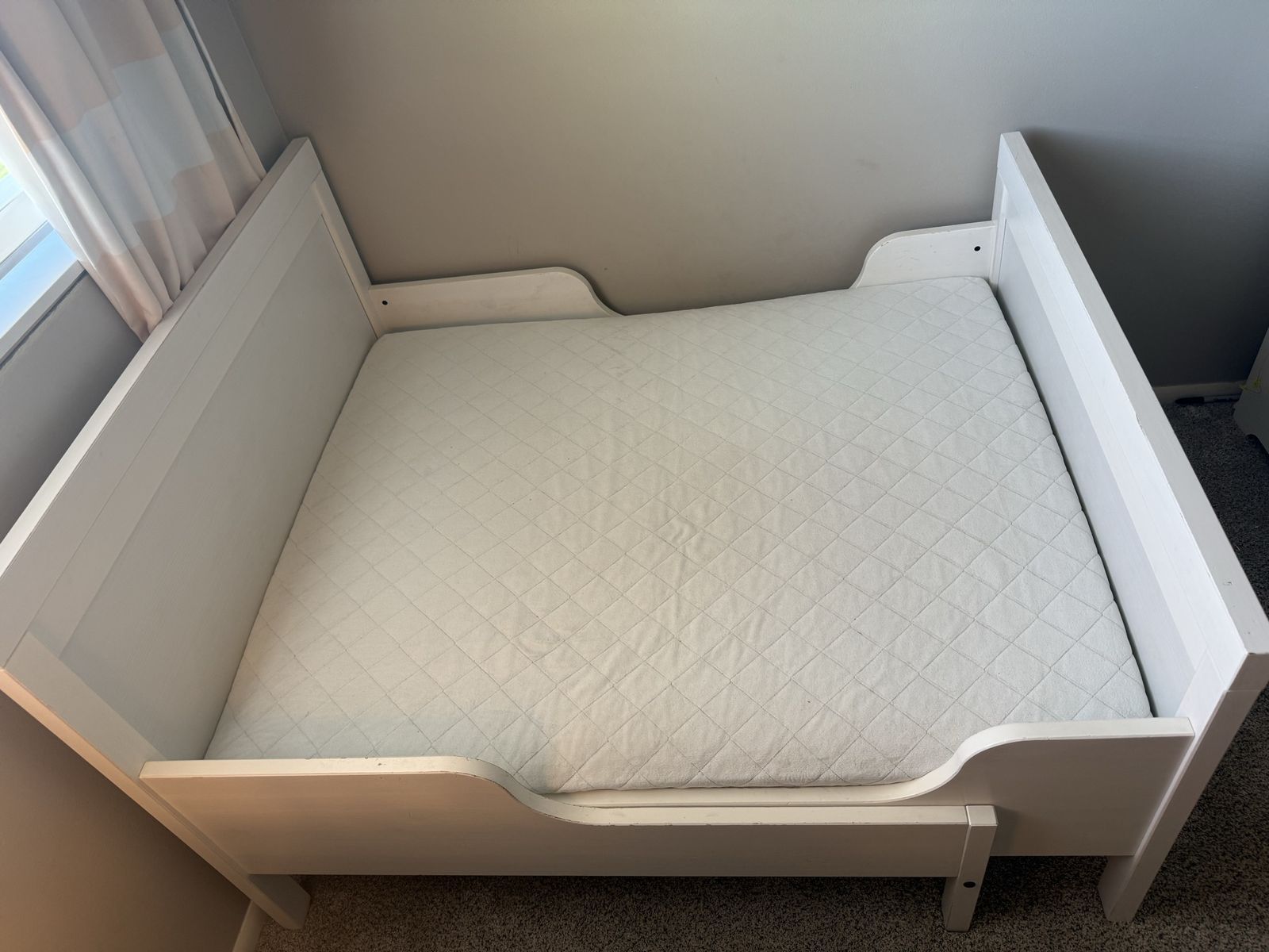 White SUNDVIK Ext bed frame with slatted bed base