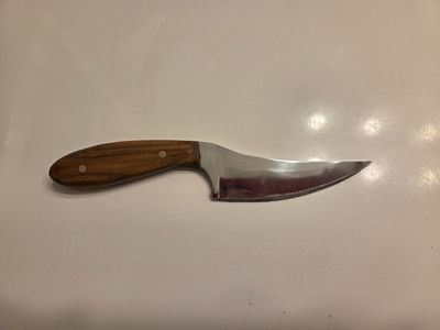 Mid-sized skinner style knife with Russian Olive handle