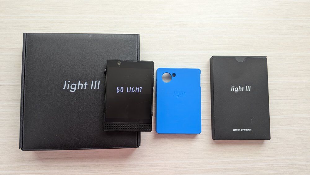 Light phone iii (unlocked) with blue case & tempered glass protectors