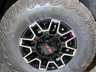 Goodyear wrangler territory MT. LT305-70-18. Mounted on GMC rims 8x180. Set of four.