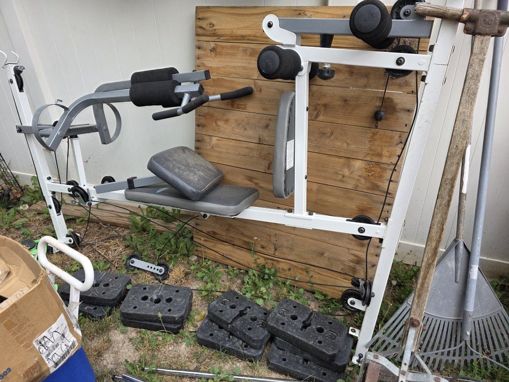 weight bench with arm and leg press