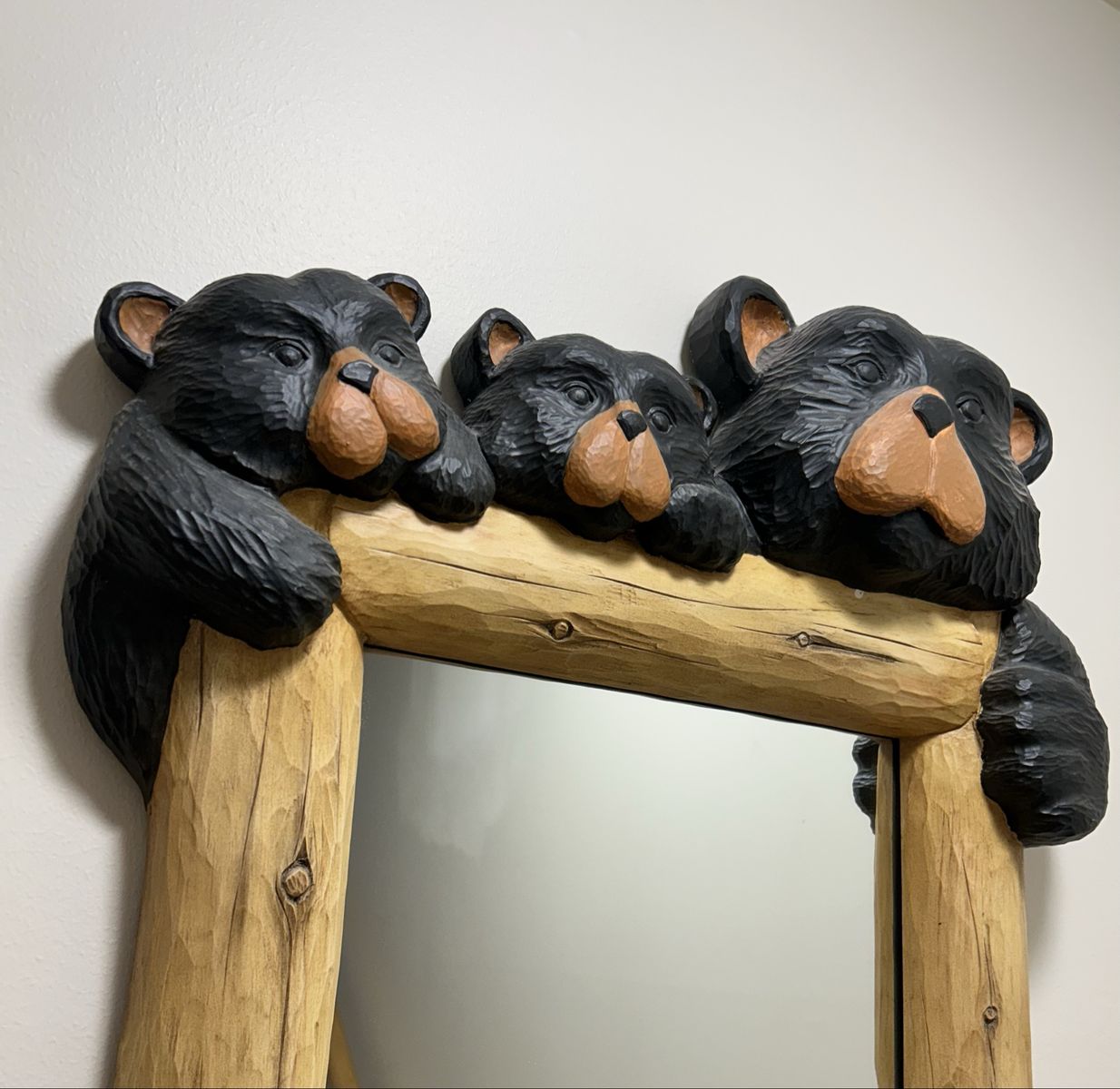 Bear and pine themed mirror.