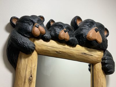 Bear and pine themed mirror.