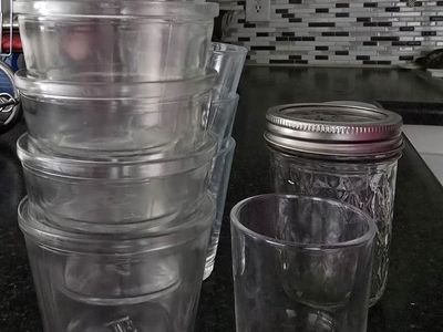 Assorted Glassware Lot Including Stackable Cups and Ball Mason Jar