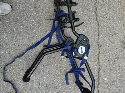 Thule Passage trunk-mounted bicycle rack designed to carry up to three bikes.