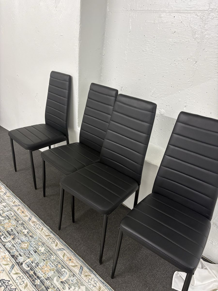 4 black leather dining chairs