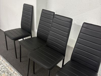 4 black leather dining chairs