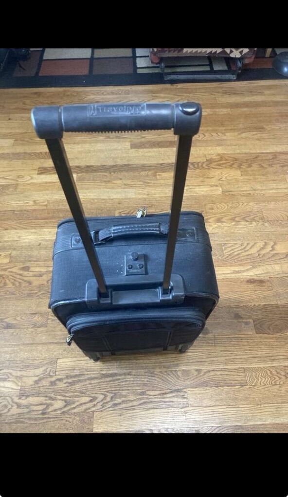TravelPro Crew Carry On Roller