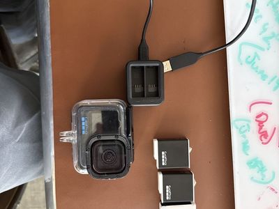 Go pro 12 black with body armor for scuba/ snorkel