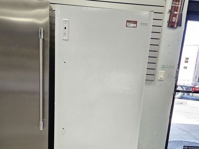White Upright Freezer - Frigidaire Brand - Good Condition - Reliable Food Storage