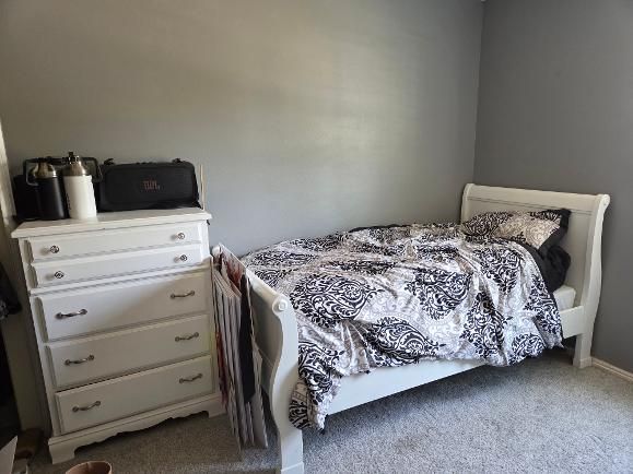 White sleigh bed with dresser