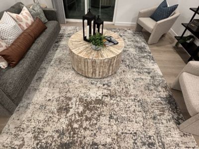 8x10 Area rug and 2 5x7 rugs