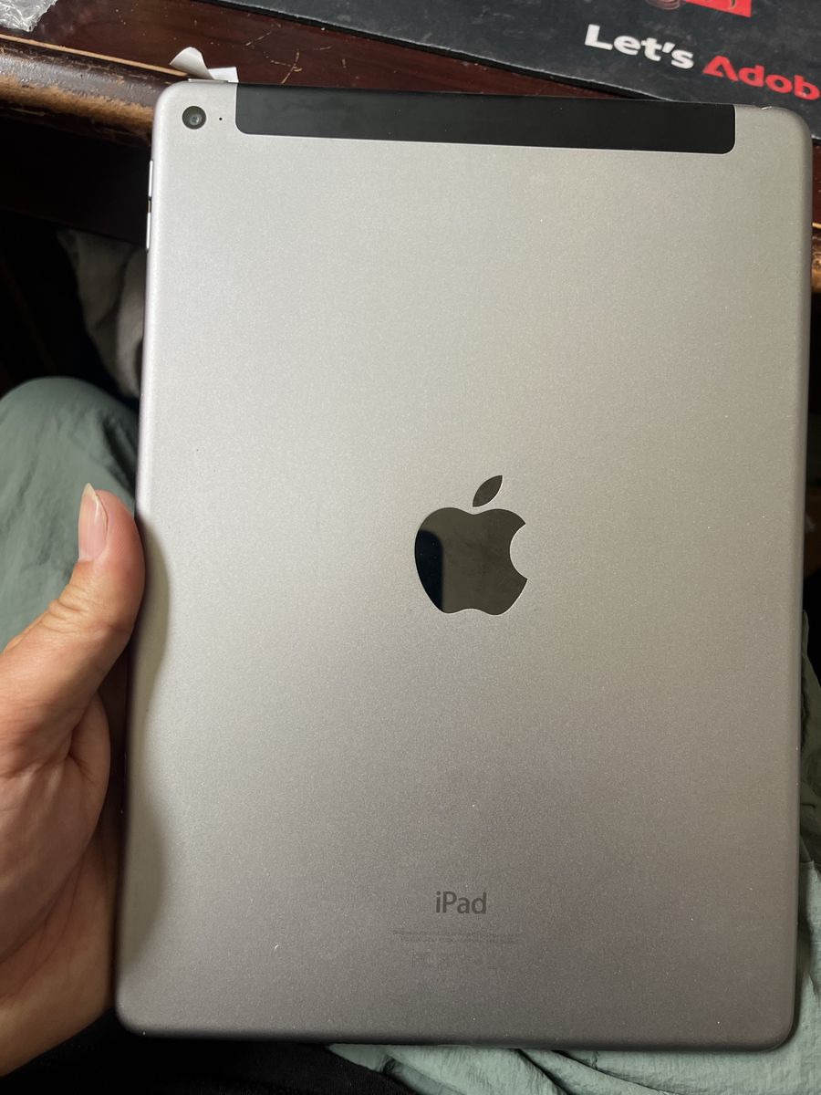 iPad Air 2, Wi-Fi + Cellular. Still good