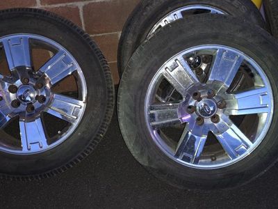 Set of 4 Ford Factory Chrome Wheels and Tires