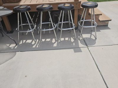 Set of 4 Chrome Bar Stools with Round Black Swivel Seats