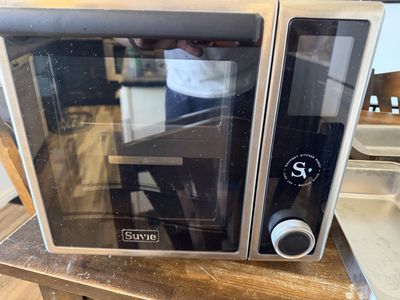 The Suvie Kitchen Robot 3.0 is an all-in-one, multi-zone smart countertop oven designed to fully automate meal preparation.