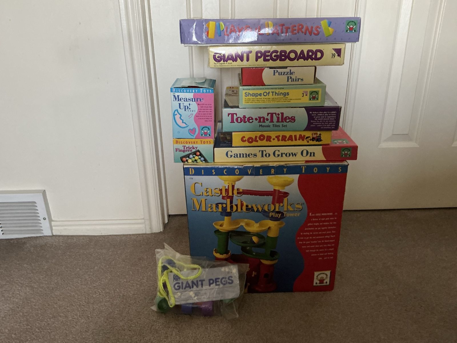 Discovery Toys Lot - 10 items-Castle Marbleworks, Playful Patterns, Giant Pegboard and extra pegs, Games to Grow On, plus 6 more