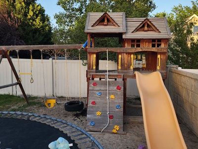 Used Outdoor Playground Playset with Slide, Swings, Rock Climbing Wall & Playhouse