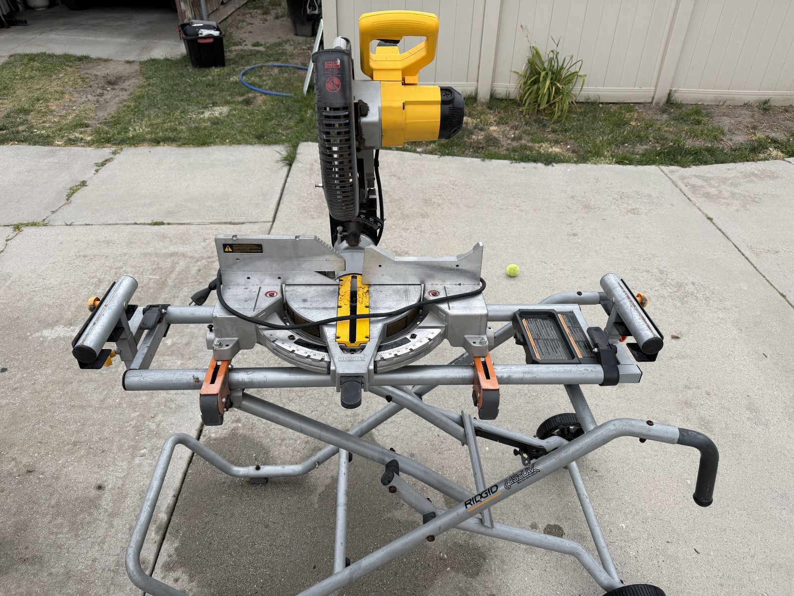 DEWALT  12" Compound Miter Saw with Ridgid Foldable Mobile Stand with Mounting Braces