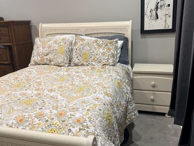 Four piece Ashley Off-White (full size) Sleigh Bed set with Carved Details with Matching dresser, chest, and Nightstand Set