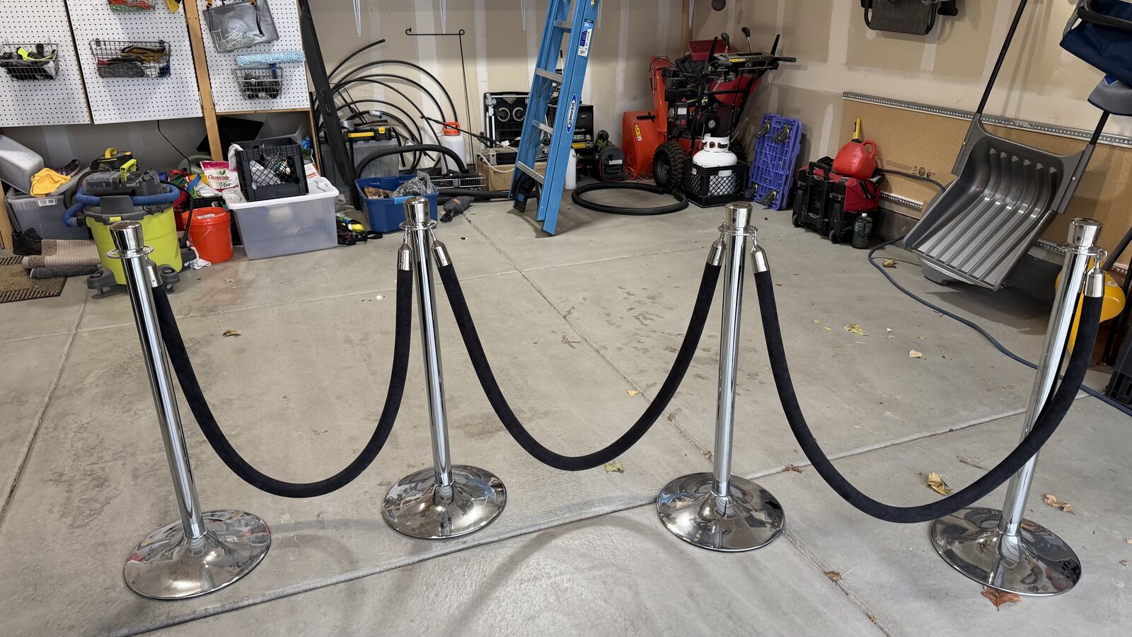 Queue poles with black velvet rope