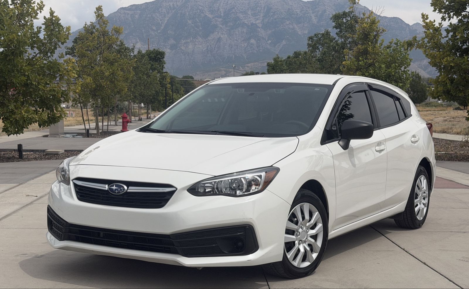2022 Subaru Impreza Base — rebuilt & branded title, 27% below market