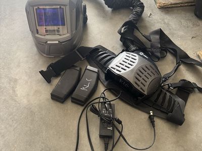 Miller T94i-R Auto-Darkening PAPR Welding Helmet System with Blower and Charger