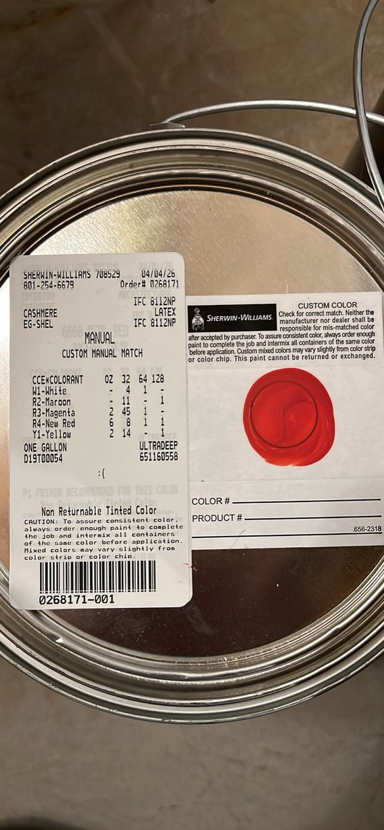 Two full cans of Sherwin Williams paint