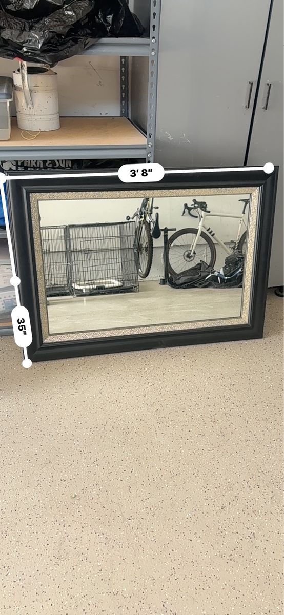 Black frame with gold trim Mirror