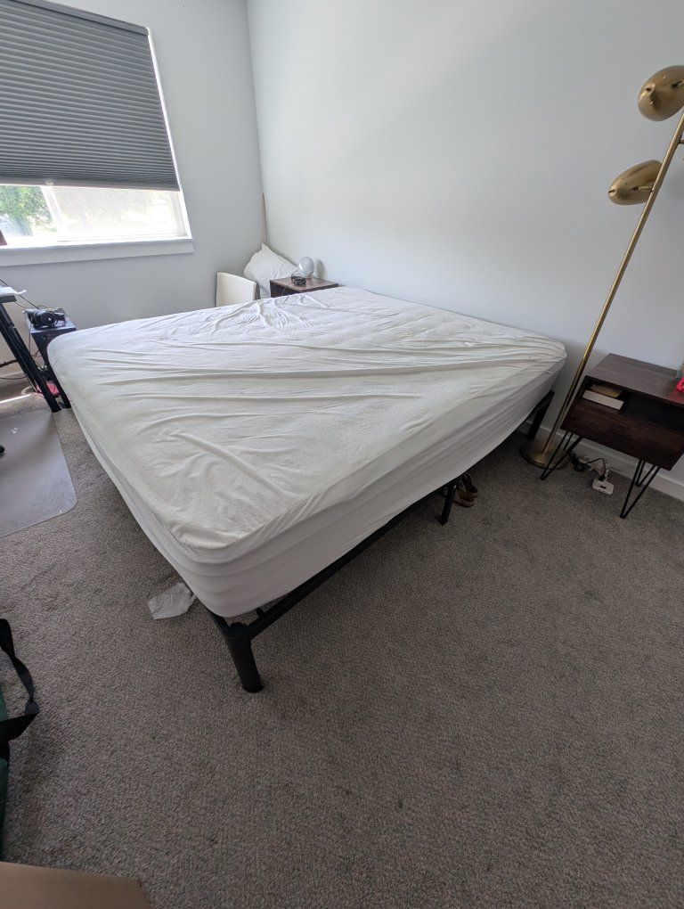 Very clean California King Mattress and bed frame