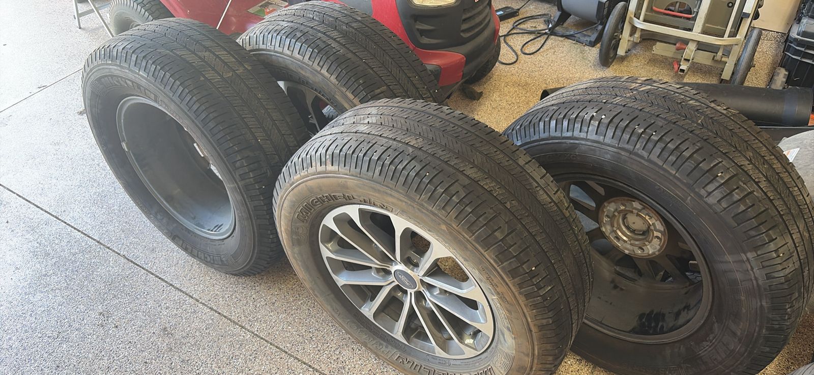 4 18 inch tires and wheels plus 2 extra tires