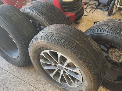 4 18 inch tires and wheels plus 2 extra tires