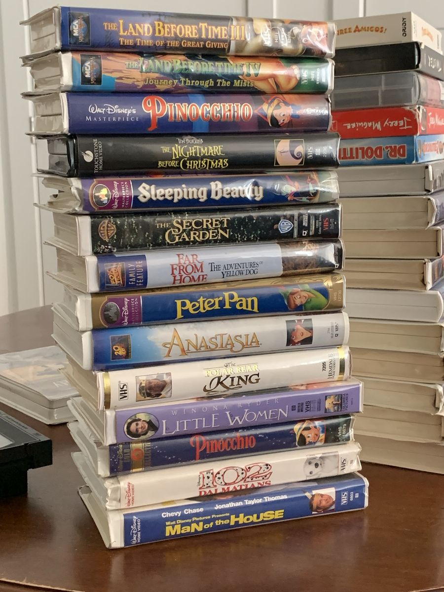 VHS Tapes: Pearl Harbor, Singin' in the Rain (Deluxe), The River, My Fair Lady,  Halloween H20, Jerry Maguire