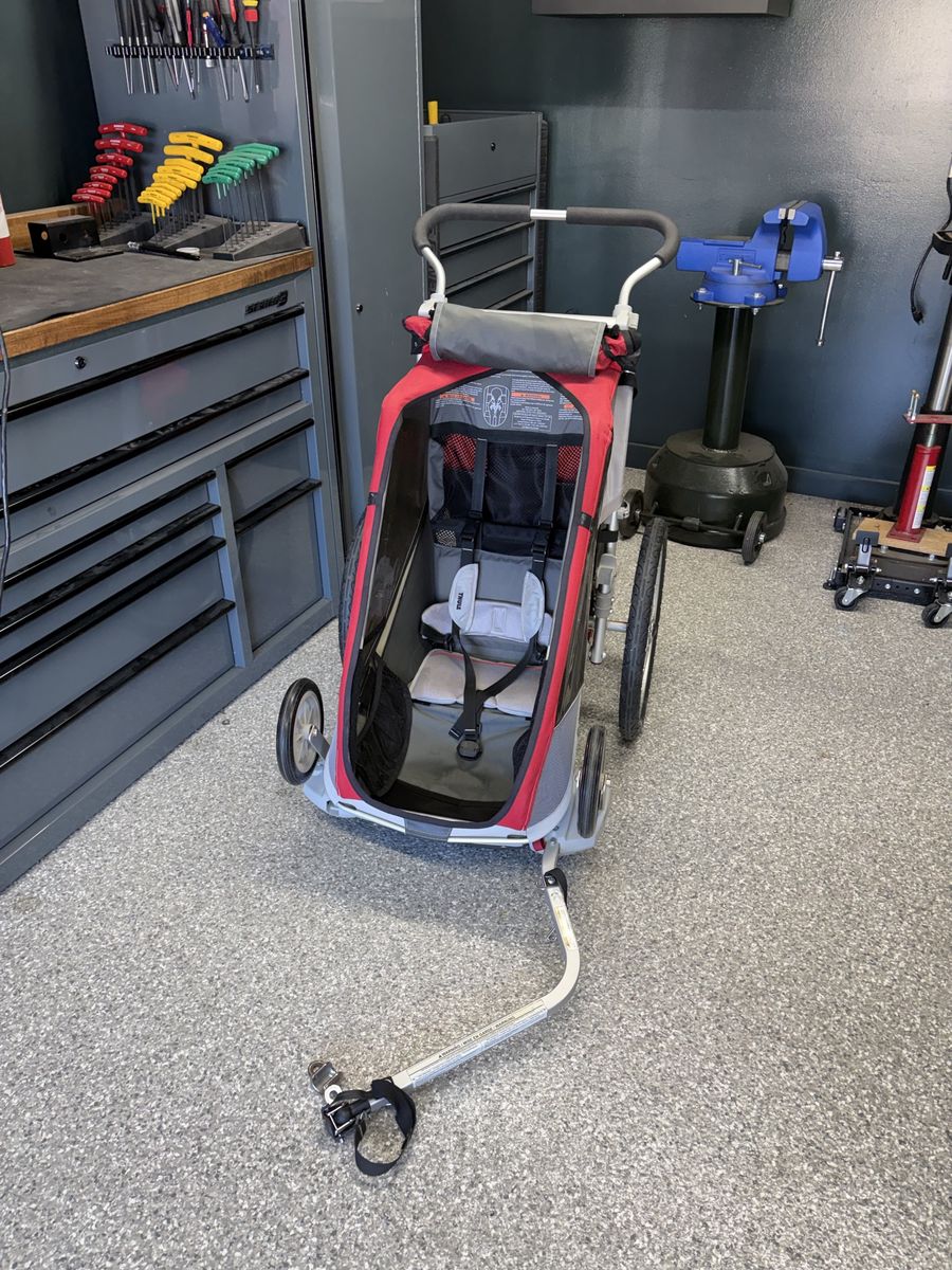 Thule Red and Gray Child Stroller and Bike Trailer
