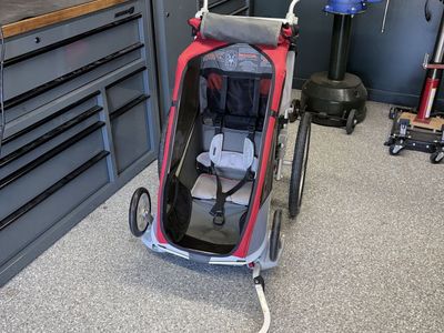 Thule Red and Gray Child Stroller and Bike Trailer