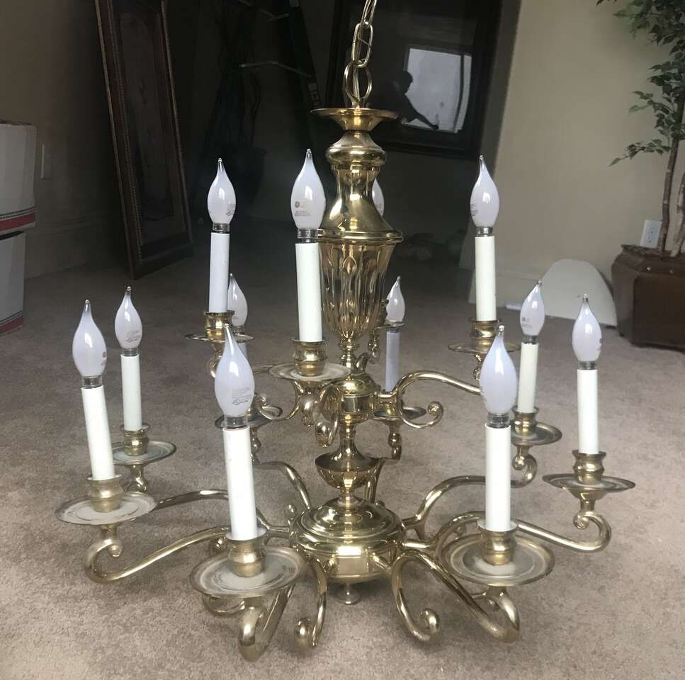 Beautiful Vintage 12 light Brass Chandlier.
