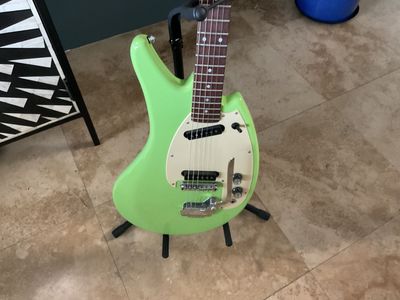 Electric guitar Eastwood with stand