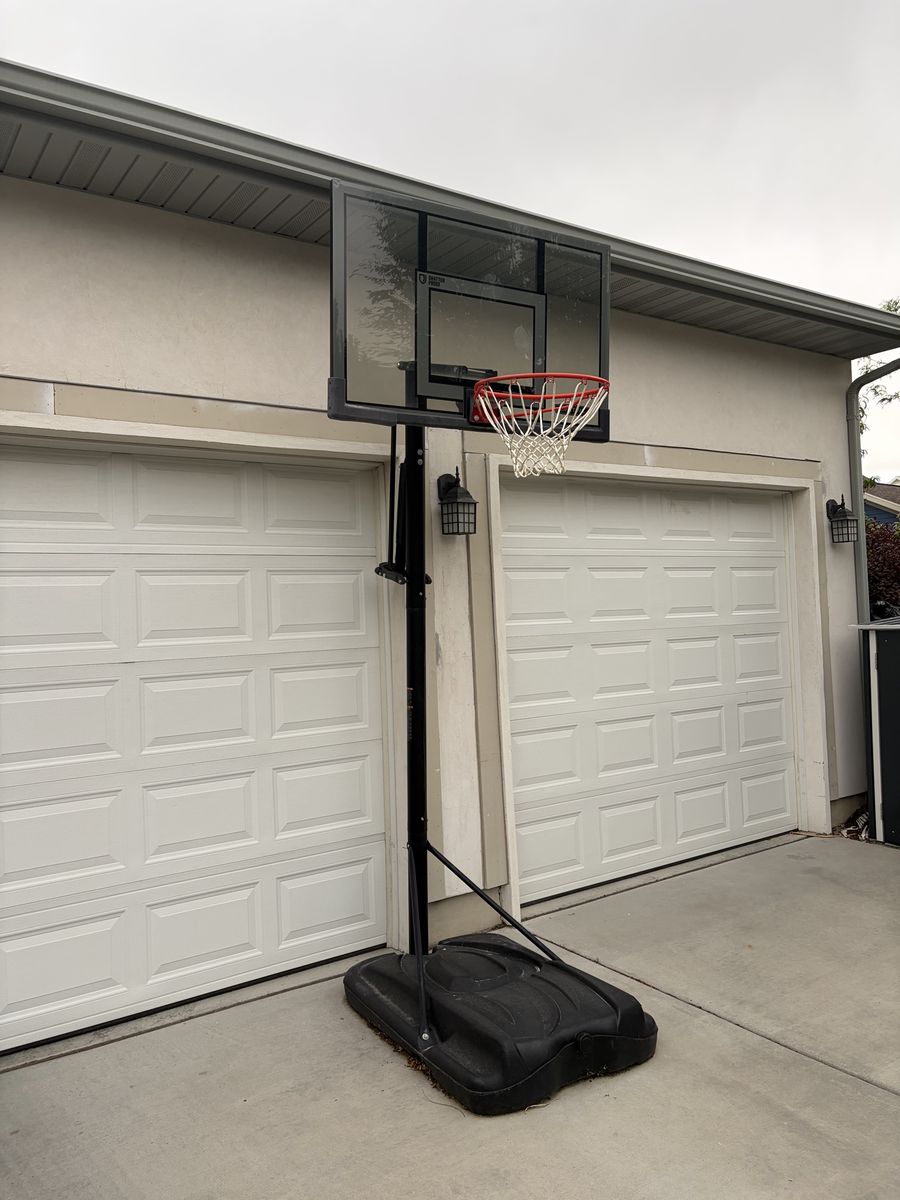 Lifetime 52” Power Lift Adjustable Portable Basketball Hoop – Model 90865