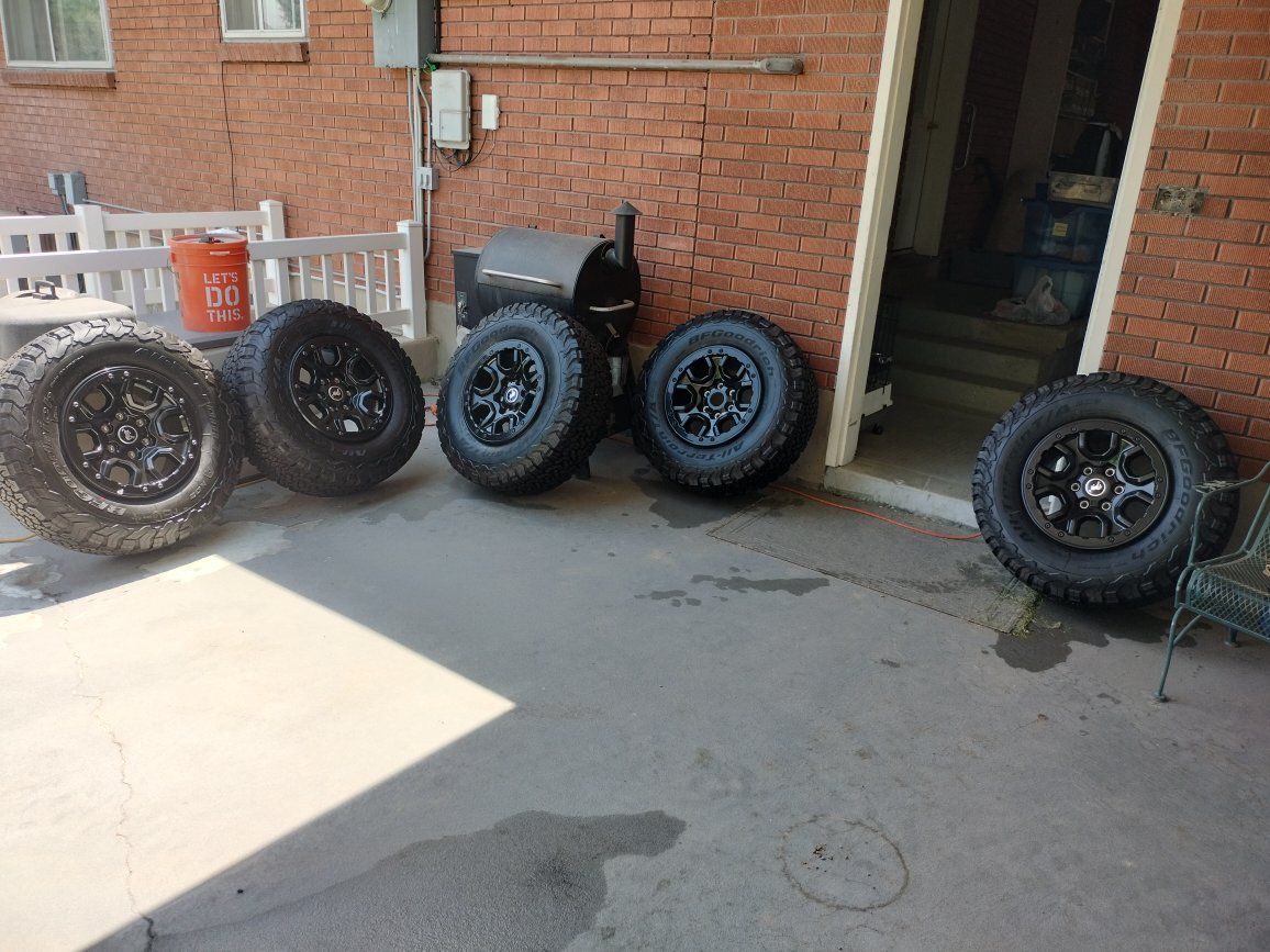 BFGoodrich All-Terrain T/A KO2 Tires LT285/70R17 with Black 17" Sasquatch Wheels (Set of 5) w/OEM tpms.
