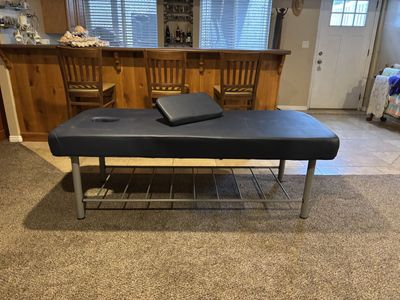Sturdy Blue Professional Massage Table with Face Cradle and Storage Shelf
