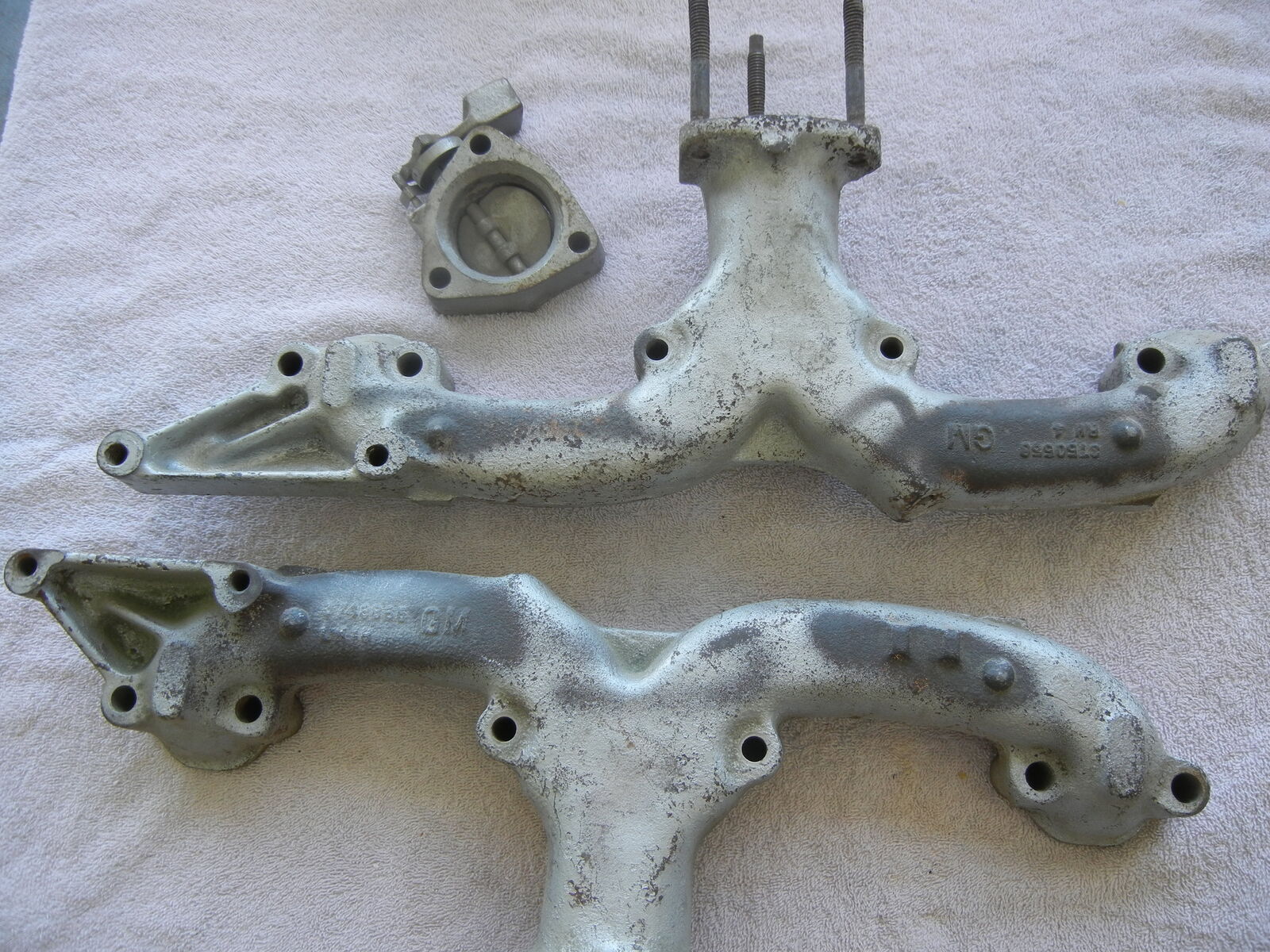 Chevy Exhaust Manifolds with Alt & AC Mounts Stock 1965