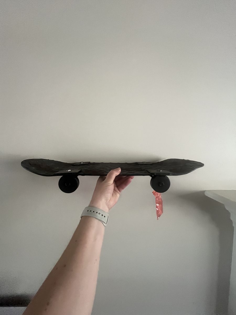 Skateboard shaped shelves