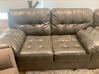 Leather couch and loveseat