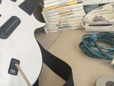 Nintendo Wii HUGE Bundle + Guitar Hero Guitar, 7 Remotes, Games & Accessories