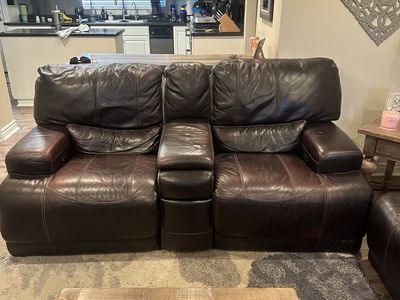 FREE! Brown leather reclining love seat.