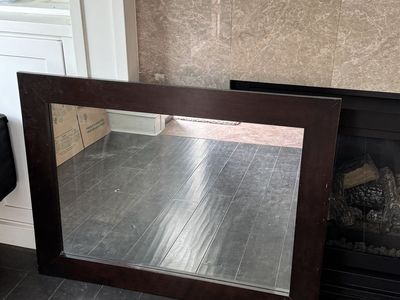 Dark wood framed mirror