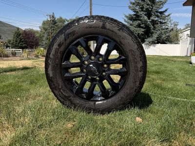 Chevrolet Silverado 2500 20-inch Black Alloy Wheel with All-Terrain Tire