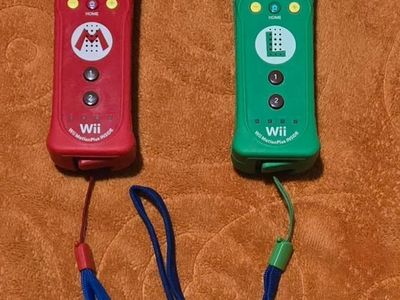 Mario & Luigi Motionplus controllers $35 each! trades considered!