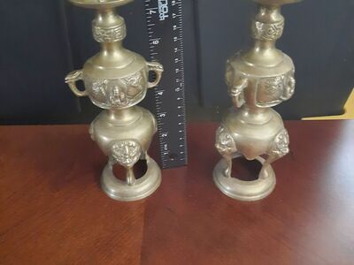 two vintage brass oriental candle holders